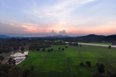 Scenic view of landscape against sky during sunset