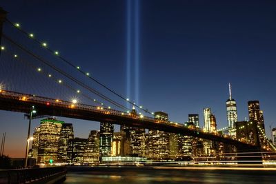 Illuminated suspension bridge at night
