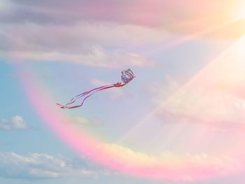 Low angle view of rainbow in sky