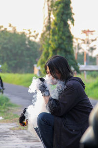 Rear view of woman with dog