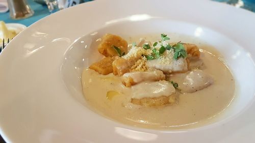 Close-up of served food in plate