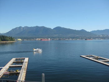 Boats moored at harbor