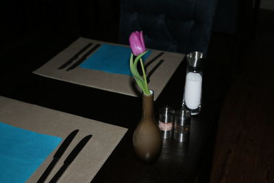 Close-up of flower vase on table