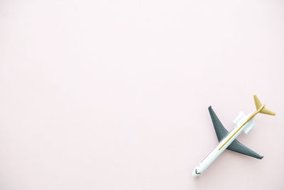 High angle view of colored pencils on white background