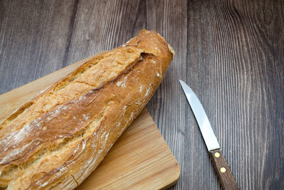 High angle view of bread on wooden table