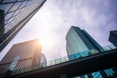 Low angle view of modern buildings against sky