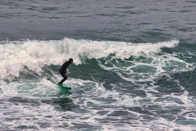 Man surfing in sea