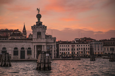 View of buildings against sky during sunset