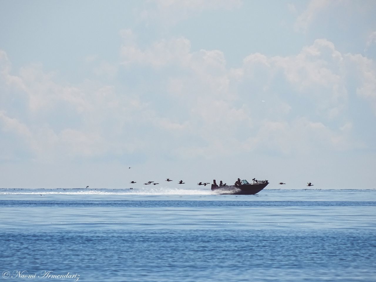 BOATS SAILING IN SEA