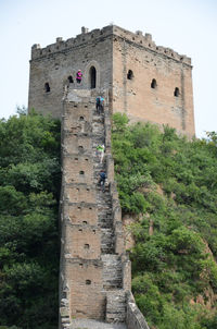 People walking on great wall of china at jinshanling