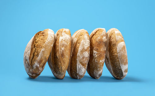Close-up of bread against white background