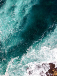 Waves splashing on rocks