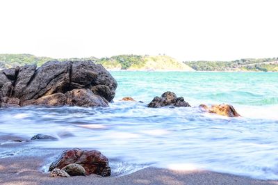 Scenic view of sea against clear sky