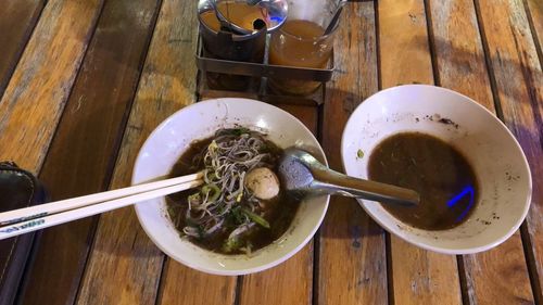 High angle view of soup in bowls on table