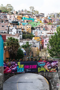 High angle view of street amidst buildings in city