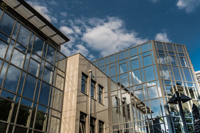 Low angle view of modern building against sky