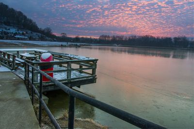 Scenic view of lake at sunset