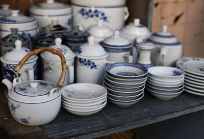 Close-up of crockeries for sale in market