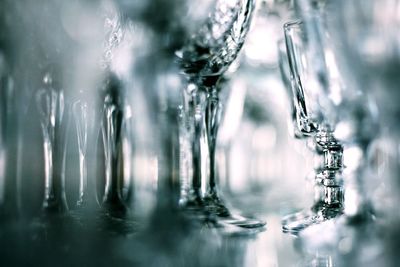 Close-up of empty wineglasses on table