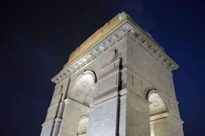 Low angle view of cathedral against sky at night