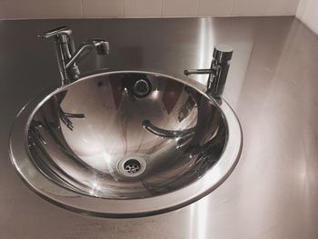 High angle view of faucet in bathroom