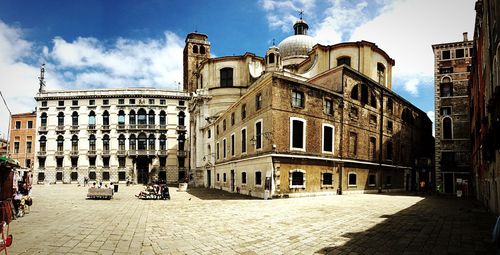 Buildings in city against sky