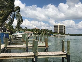 Pier on lake against sky
