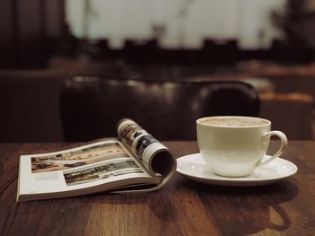 Close-up of coffee served on table