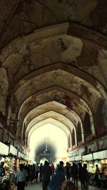 People in corridor of building