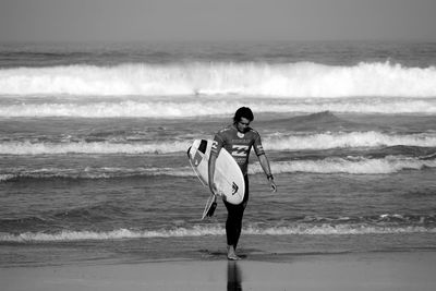 Boy playing on beach