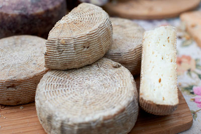 Goat cheese on a trade counter. daylight