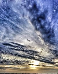 Low angle view of clouds in sky during sunset