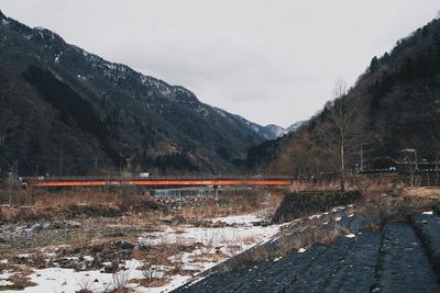 Scenic view of mountains against sky during winter