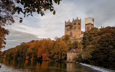 Low angle view of cathedral against cloudy sky