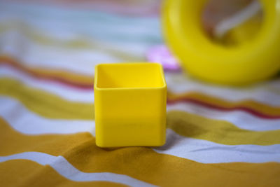 Close-up of yellow plastic toy