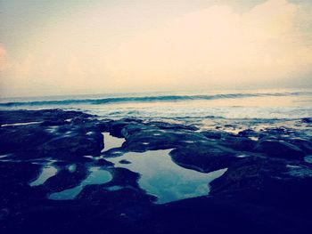 Scenic view of sea against clear sky