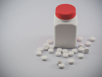 High angle view of bottle on white background