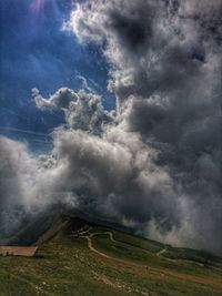 Scenic view of land against sky