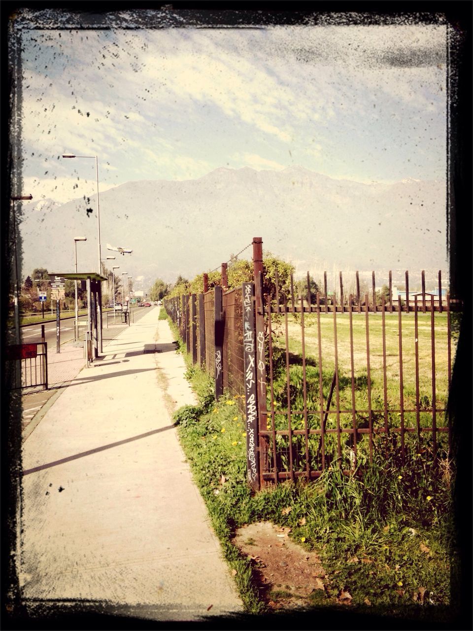 transfer print, fence, sky, auto post production filter, the way forward, grass, field, tranquility, tranquil scene, nature, landscape, protection, diminishing perspective, day, empty, footpath, outdoors, cloud - sky, no people, safety