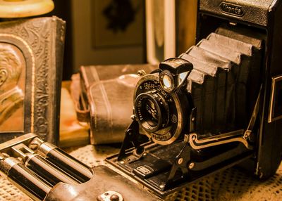 Close-up of vintage camera on table