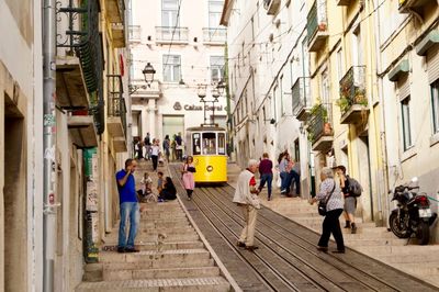 People on street in city