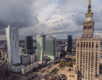 Palace of culture and science against sky in city