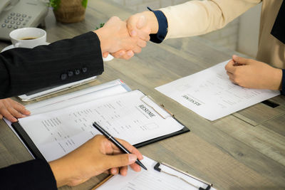 High angle view of people on table