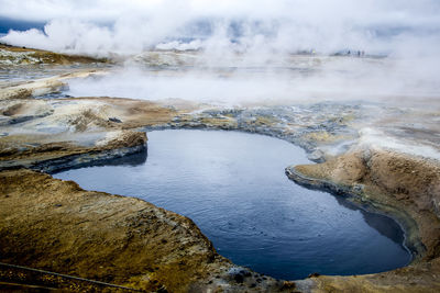 High angle view of smoke emitting from hot spring