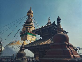 Low angle view of swayambhunath temple against clear sky