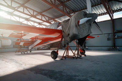 High angle view of airplane on airport runway