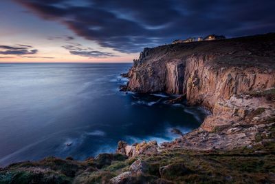 Scenic view of sea against sky at sunset