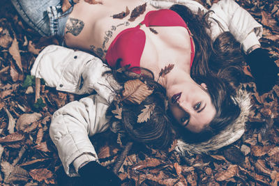 Portrait of young woman lying down