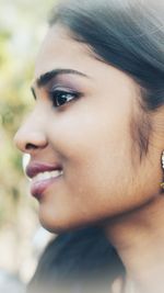 Close-up portrait of woman looking away