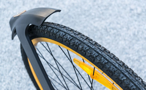 Cropped image of bicycle on road